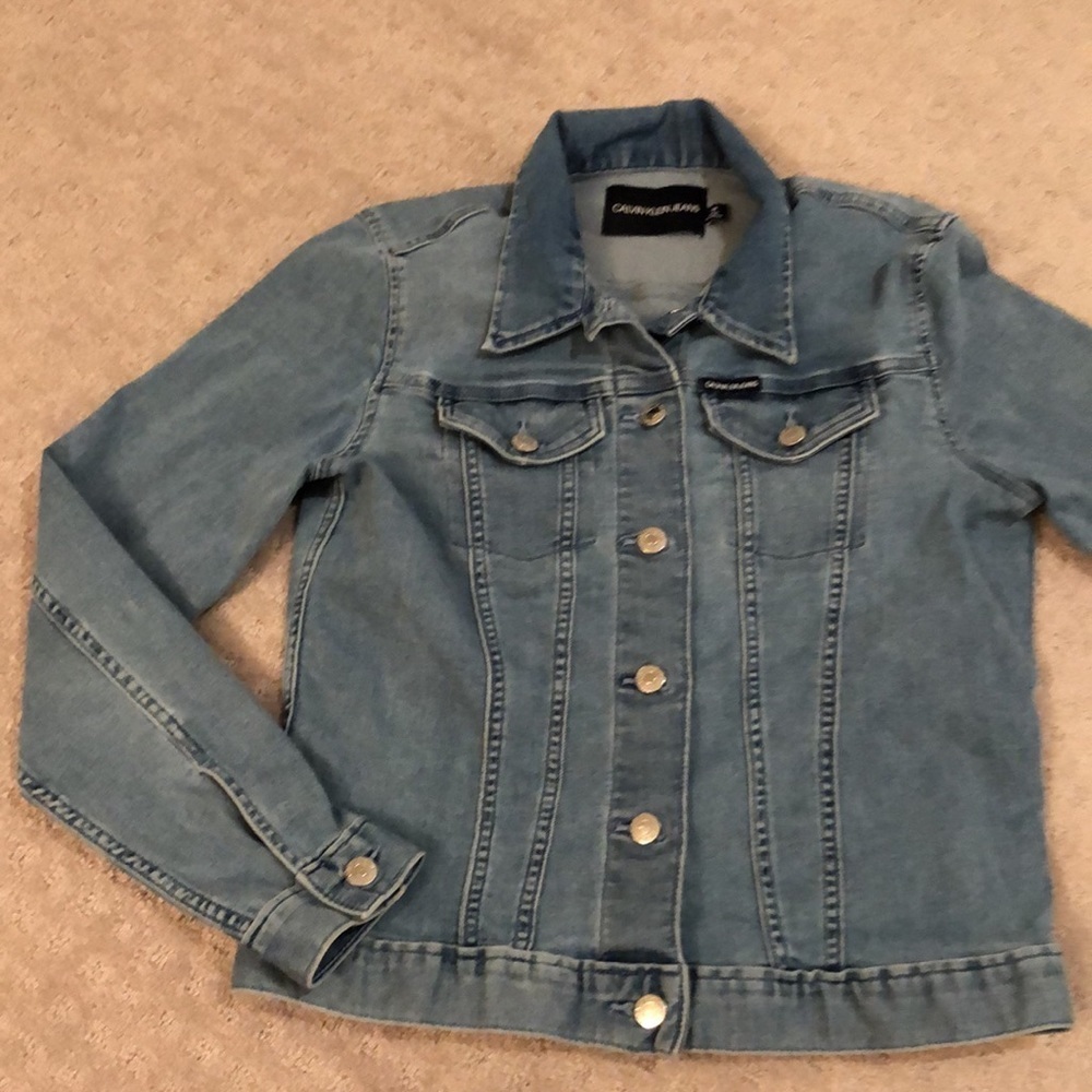 Calvin Klein blue denim jean jacket.  Button up. Great stretch!